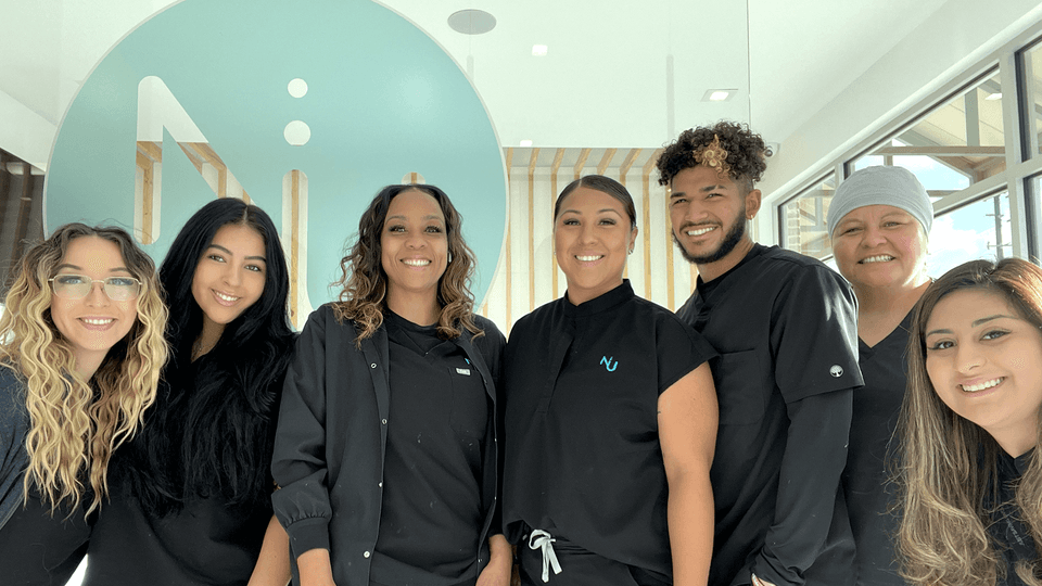 A group of dental assistants at the office.